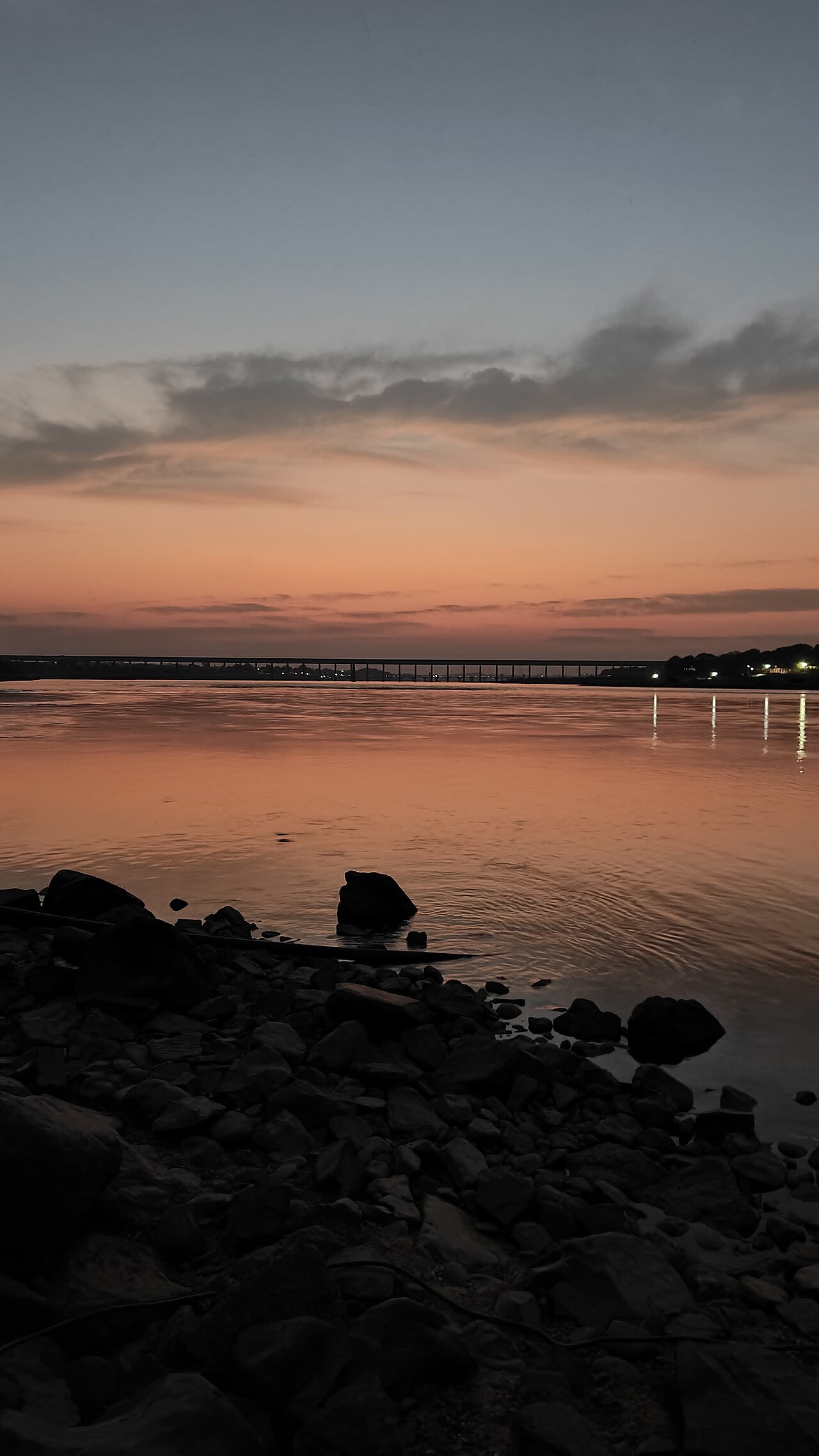 Golden evening light over the Narmada River at Maheshwar